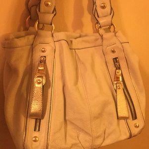 B. Makowsky cream leather purse